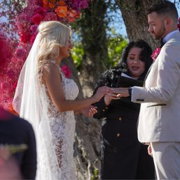 Heather officiating our wedding. We were exchanging the rings