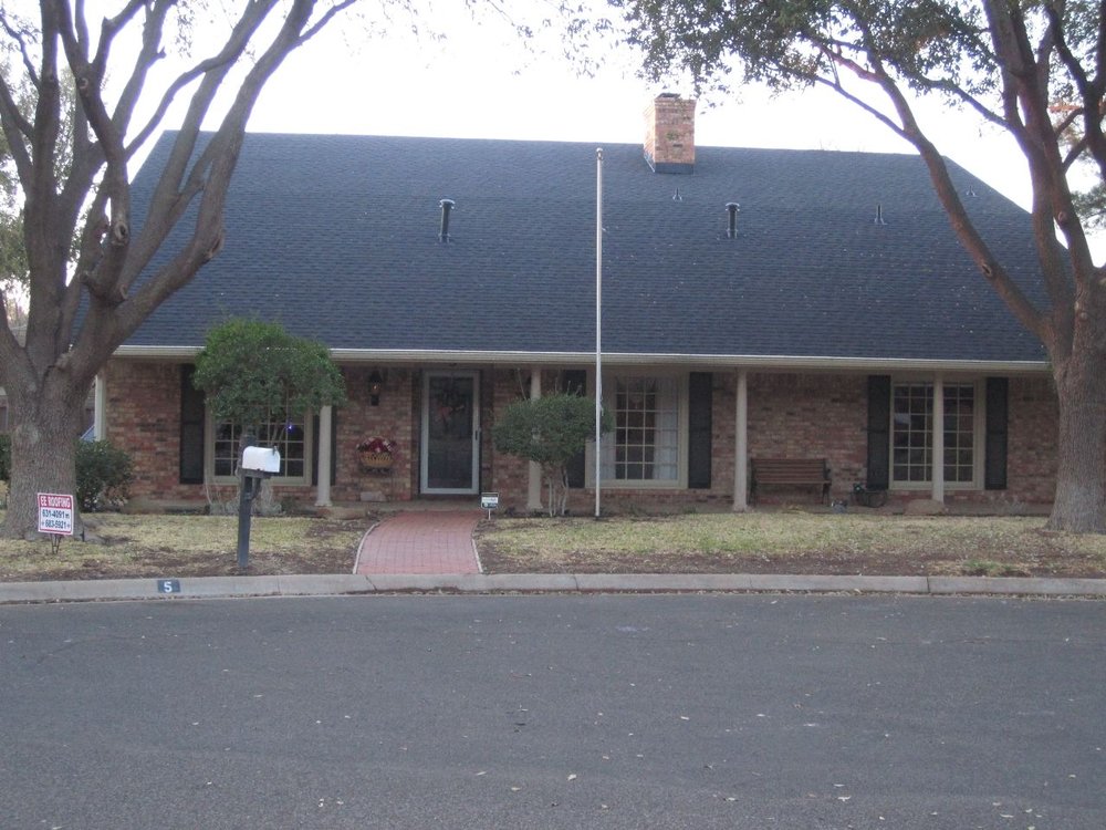 Slide of E E Roofing