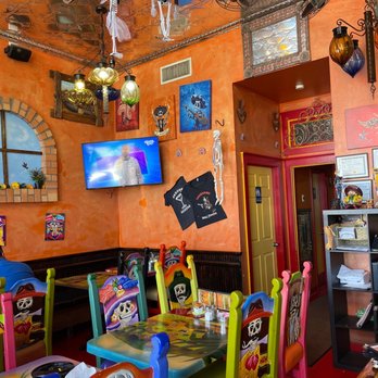 Vaqueros Grill & Cantina - brightly colored tables and chairs - Mexican Near Me - Jerome, Arizona