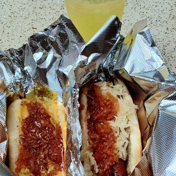 Fulton Hot Dog King - Sausage hot mustard, cheese and onions & Sausage hot mustard, saurkrat and onions. Pineapple and lemonade drink. - Hot Dogs Near Me - Brooklyn, New York Fulton Hot Dog King - Sausage hot mustard, cheese and onions & Sausage hot mustard, saurkrat and onions. Pineapple and lemonade drink. - Hot Dogs Near Me - Brooklyn, New York