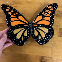 The Bent Brush - I painted this and this is after it's been in the kiln and fired.