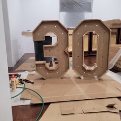 Craftsman Home Services - Custom wood marquee numbers