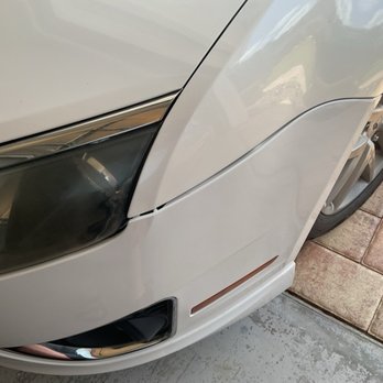Special-T Auto - Left front lower panel replaced and colors are white, this car had a gorges pearl white finish - Auto Repair Near Me - Crystal River, Florida