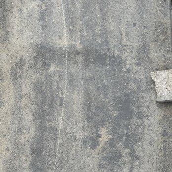 Stout Creek Landscapes - Scratched down the middle and chipped on the right paver. - Landscaping Near Me - Belmont, Michigan