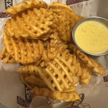 Jake Melnick's Corner Tap - Seasoned Waffle Fries w/cheese - Sports Bars Near Me - Chicago, Illinois