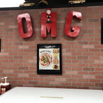 Oh My Gyro - a brick wall with a sign that says oh gyro - Halal Near Me - Longwood, Florida Oh My Gyro - a brick wall with a sign that says oh gyro - Halal Near Me - Longwood, Florida