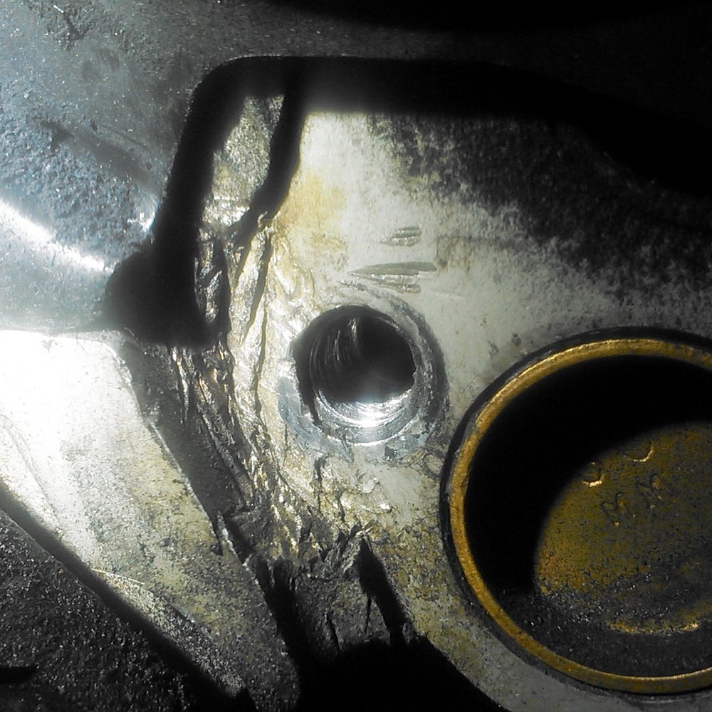 Main St. Auto & Fleet - The tensioner hole, ruined. (for my timing belt). It forced me to get a new cylinder head. It's Jamie's workmanship here. - Auto Repair Near Me - Barstow, California Main St. Auto & Fleet - The tensioner hole, ruined. (for my timing belt). It forced me to get a new cylinder head. It's Jamie's workmanship here. - Auto Repair Near Me - Barstow, California