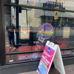 a sign in front of a window