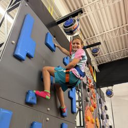 Outer Limits Adventure Park - Rocking the climbing wall!