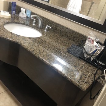 Hampton Inn & Suites Buffalo Downtown - Bathroom and coffee pot - Hotels Near Me - Buffalo, New York Hampton Inn & Suites Buffalo Downtown - Bathroom and coffee pot - Hotels Near Me - Buffalo, New York