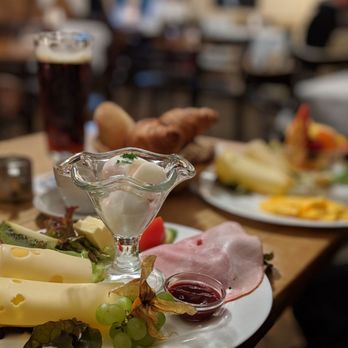 Schwarzes Café - Cheeses, meats, and a perfectly poached egg. Comes with fruit, be mindful of the kiwi if you're allergic. - Breakfast & Brunch Near Me - Berlin, BE