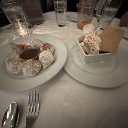 Cinnamon sugar beignets and toasted marshmallow dessert Cinnamon sugar beignets and toasted marshmallow dessert