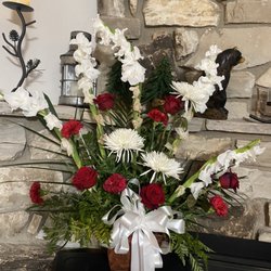Jacks Flower Shop - Unacceptable. Less than 4 days old and was supposed to come from a florist but I don't know who could stand behind work like this.