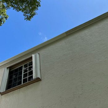 Get Gutters - New gutter seamed with neighbor - Gutter Services Near Me