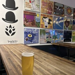 Beer in front of the two blokes mural