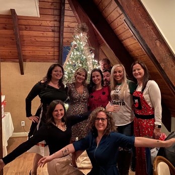 Attic the At Waterman's - a group of women posing in front of a christmas tree - Venues & Event Spaces Near Me - Virginia Beach, Virginia Attic the At Waterman's - a group of women posing in front of a christmas tree - Venues & Event Spaces Near Me - Virginia Beach, Virginia