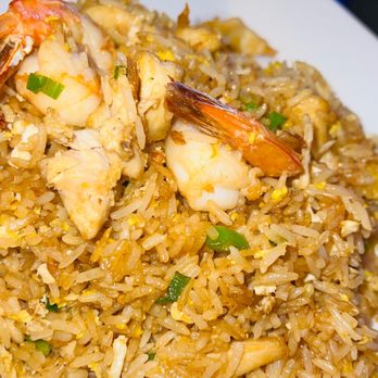 Sol De Oro - a plate of fried rice with shrimp - Steakhouses Near Me - Lake Placid, New York Sol De Oro - a plate of fried rice with shrimp - Steakhouses Near Me - Lake Placid, New York