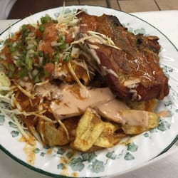 La Colonia - This place knocks my socks off! Beef soup, chicken tacos and porkchops with plantains! All for $30!