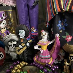 Black Butterfly Too - The Sweet owner gave them these two for free! The two small Day of the dead dolls