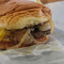 Cheeseburger w/grilled onions and mustard
