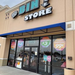 The Bin Store - The sign on the window tells you the cost of each item, depending on what day of the week it is.