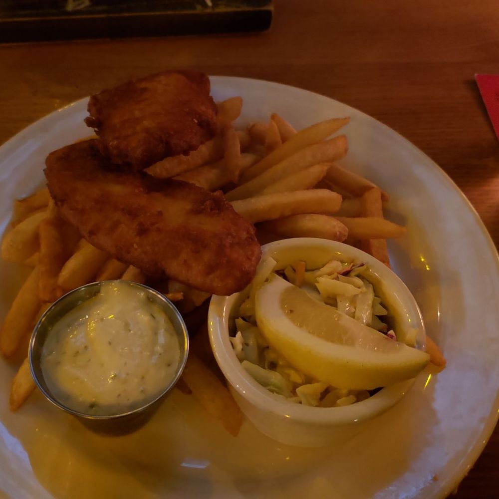 McMenamins Woodshop - Two hilariously tiny pieces of fish for $24.50. Compare size against the small lemon wedge. - New American Near Me - Bothell, Washington McMenamins Woodshop - Two hilariously tiny pieces of fish for $24.50. Compare size against the small lemon wedge. - New American Near Me - Bothell, Washington