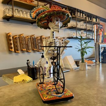 Solbird Kitchen & Tap - a table with a bicycle on it - Tex-Mex Near Me - Fort Wayne, Indiana