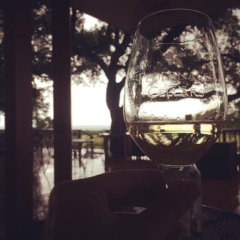 Pedernales Cellars - Enjoying a wonderful moscato and watching the storm go by - Wineries Near Me - Stonewall, Texas
