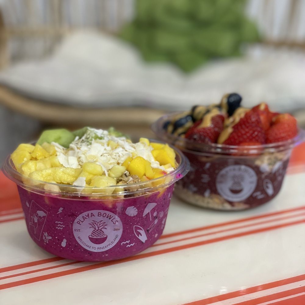 Playa Bowls - a bowl of fruit and a bowl of yogurt - Juice Bars & Smoothies Near Me - Davie, Florida Playa Bowls - a bowl of fruit and a bowl of yogurt - Juice Bars & Smoothies Near Me - Davie, Florida