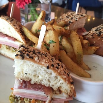 Lalla Grill Oceanside - Muffuletta with firecracker fries. SO GOOD! - Seafood Near Me - Monterey, California Lalla Grill Oceanside - Muffuletta with firecracker fries. SO GOOD! - Seafood Near Me - Monterey, California