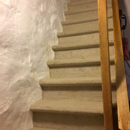 Carpeted steps. Very impressed with the skill of the installer, especially since our walls/steps are so uneven.