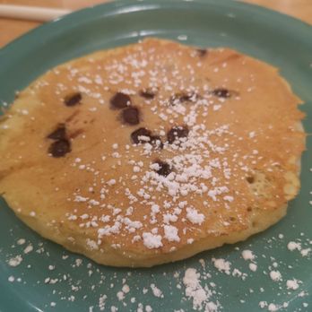 Cora's Breakfast & Lunch - a stack of pancakes with powdered sugar on top - Breakfast & Brunch Near Me - Mississauga, Ontario Cora's Breakfast & Lunch - a stack of pancakes with powdered sugar on top - Breakfast & Brunch Near Me - Mississauga, Ontario