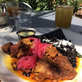 Maya Del Sol - Cochinita Pibil and mangaso drink - Latin American Near Me - Oak Park, Illinois Maya Del Sol - Cochinita Pibil and mangaso drink - Latin American Near Me - Oak Park, Illinois