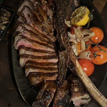 Sidecut Steakhouse - Long-Bone Dry Aged Ribeye. - Steakhouses Near Me - Whistler, British Columbia