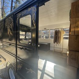 Bus with merch and a table