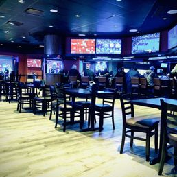 Waiting/seating area with adjacent bar