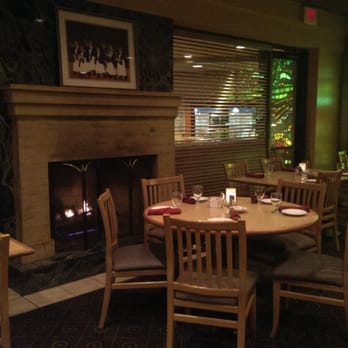 Charlies Chophouse - a dining room with a fireplace - Steakhouses Near Me - Southgate, Michigan Charlies Chophouse - a dining room with a fireplace - Steakhouses Near Me - Southgate, Michigan