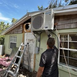 Boyar Air Solutions - Removal of old package unit. installed a new modern unit above the flood plain. This photo was work in progress.