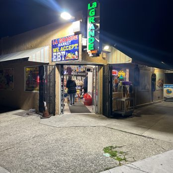 LA Grande Market - a man walking into a store - Grocery Near Me - Hayward, California LA Grande Market - a man walking into a store - Grocery Near Me - Hayward, California