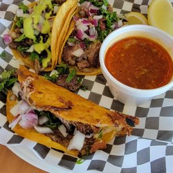 Tacos Los Rabanitos - Left to right, asada taco and lengua taco. Bottom taco is the quesabirria