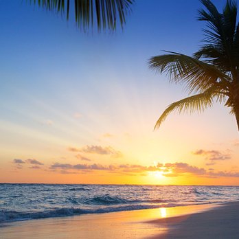 Destination Known Travel - Beautiful beach sunrise - Travel Agents Near Me