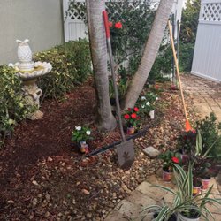 In the Son Lawn Maintenance - Project in December 2016 with river rock and plant/ flower assortment/ Bef. Pic