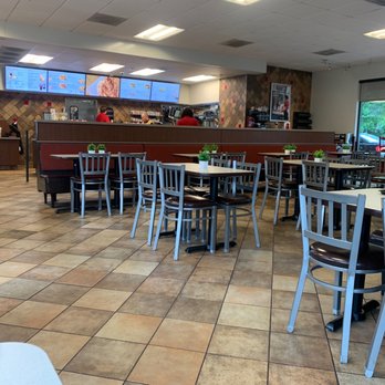 Chick-fil-A - ows tables and chairs in a restaurant - Fast Food Near Me - Franklin, Tennessee