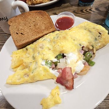 Keys Cafe & Bakery - Custom omelet filled with cream cheese, green peppers, ham, bacon, onion. - Bakeries Near Me - Roseville, Minnesota Keys Cafe & Bakery - Custom omelet filled with cream cheese, green peppers, ham, bacon, onion. - Bakeries Near Me - Roseville, Minnesota
