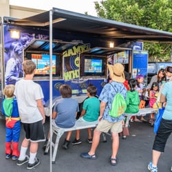 Everyone's having a great time playing games on our outside TV's on the 16' Game Truck!