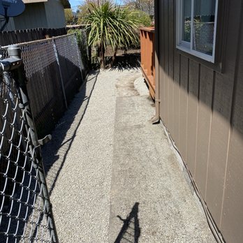 Valencia Lawn Care - the shadow of a fence on the sidewalk - Lawn Services Near Me Valencia Lawn Care - the shadow of a fence on the sidewalk - Lawn Services Near Me