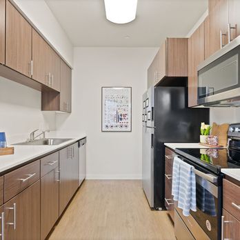 Acero West Salem Apartments - Kitchen with Stainless Steel Appliances - Apartments Near Me - Salem, Oregon Acero West Salem Apartments - Kitchen with Stainless Steel Appliances - Apartments Near Me - Salem, Oregon