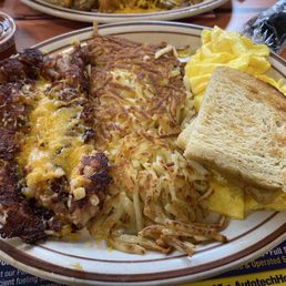 Corned beef hash and eggs. Corned beef hash and eggs.