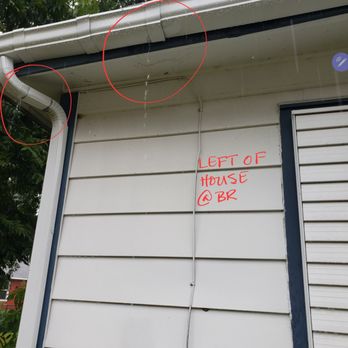Renovation Masters - a picture of a house with a sign on the side of the house - General Contractors Near Me Renovation Masters - a picture of a house with a sign on the side of the house - General Contractors Near Me
