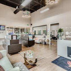 Trend Sassy Laser & Med Spa - Relax in our inviting front area featuring client seating, premium skincare products, and a complimentary water, tea & coffee station.